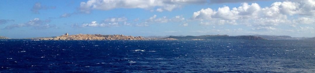The islands of the Maddalena archepelago between Corsica and Sardina viewed from Norwegian Epic