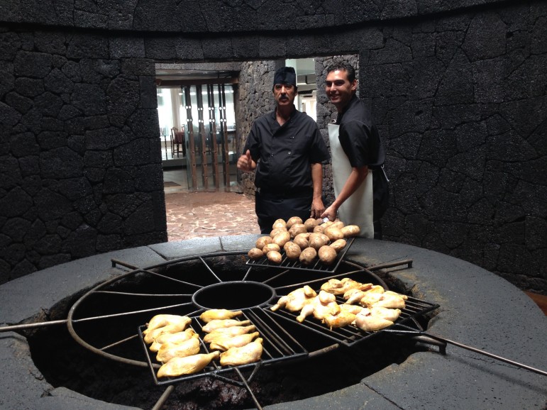 Chefs cooking using geothermal heat at El Diablo restaurant. 