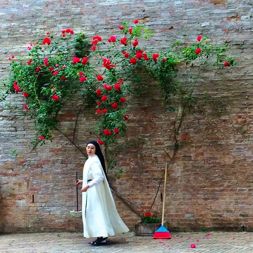 Nun at Santuario di Santa Caterina, in Siena, Tuscany