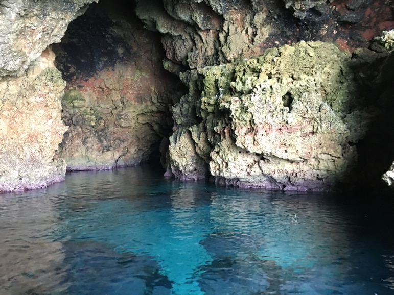 Things to do in Menorca - explore the island's caves and coves