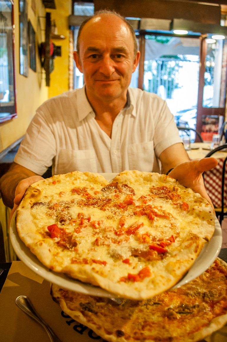 Enjoying a heart shaped pizza at Da Vittorio’s pizzeria