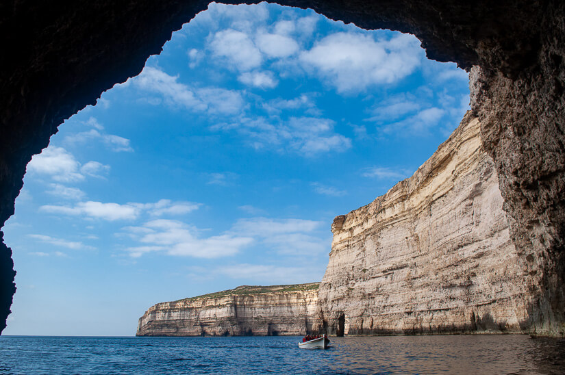 Emerging from a sea cave near the site of the Azure Window in Dwejra, Gozo